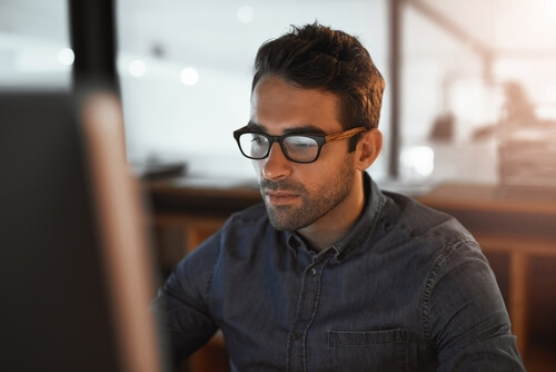 man on computer