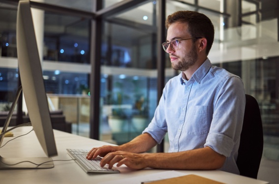 man on computer